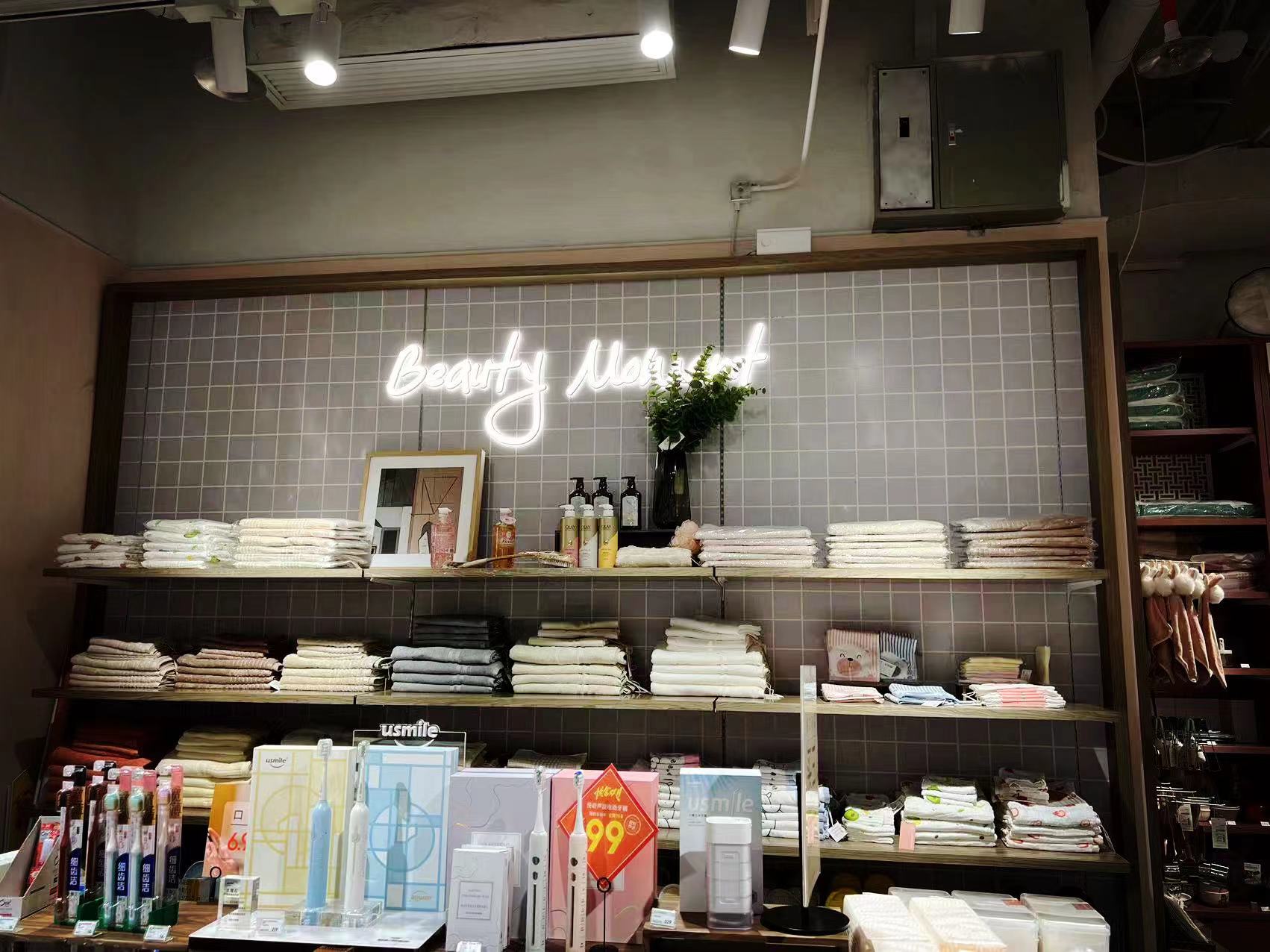 Showcase | Elevating the Everyday Essentials Retail Store with Custom White Neon Signs