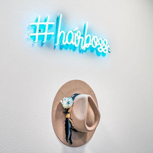 How did Neon light signs shape urban culture and modern advertising?