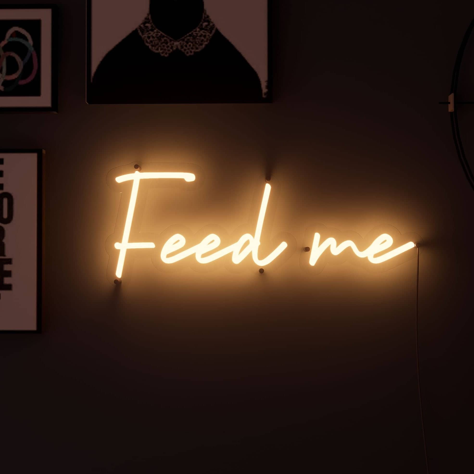 Bright Feed Me bedroom neon sign enhances decor.