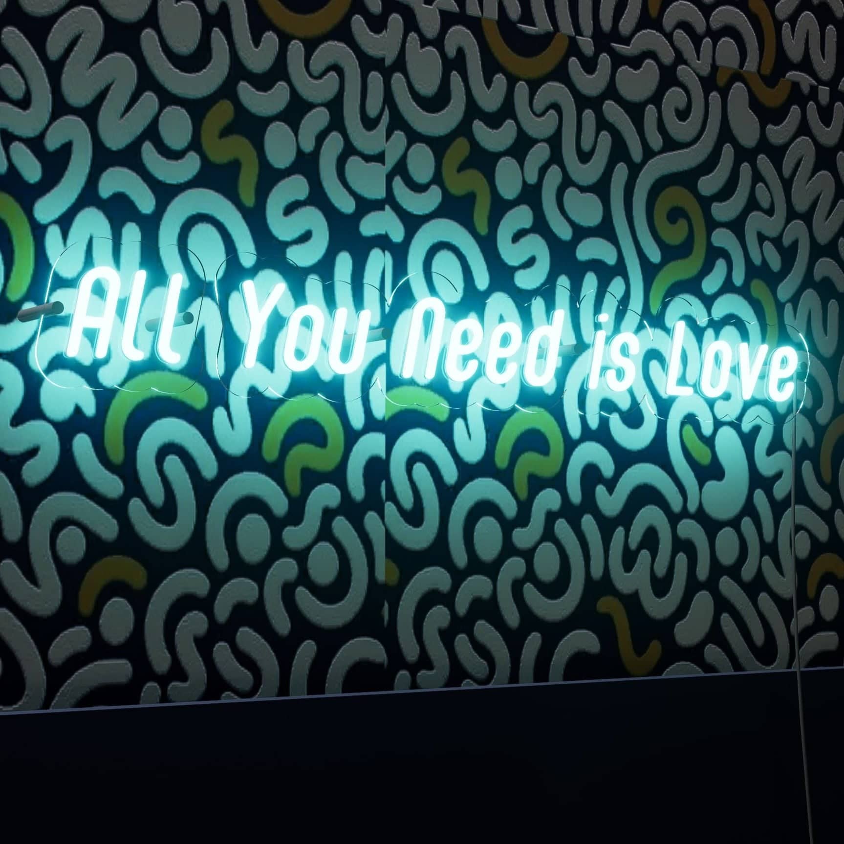 Bedroom neon sign 'All You Need is Love' adds charm