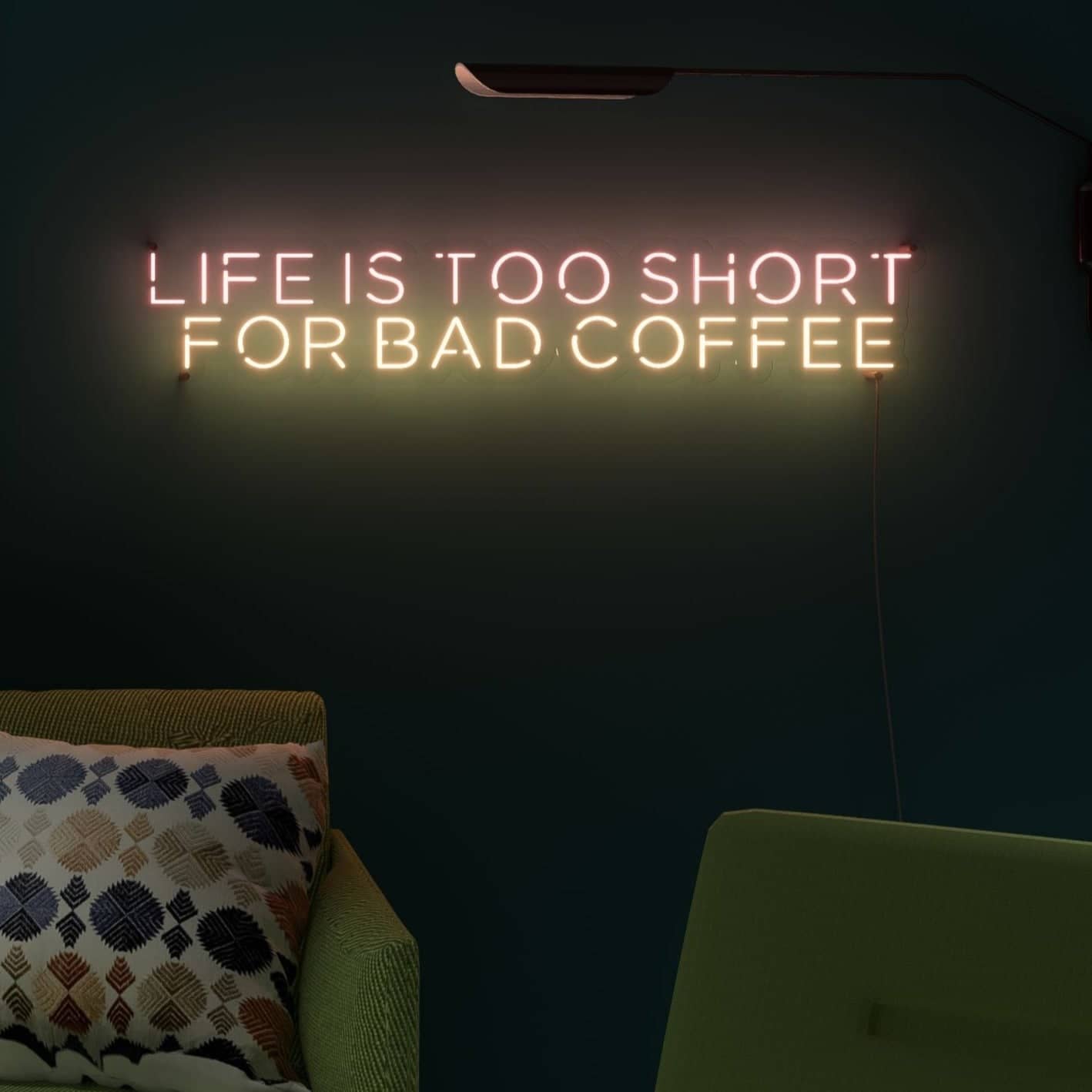 Life Is Too Short for Bad Coffee' sign glows warmly