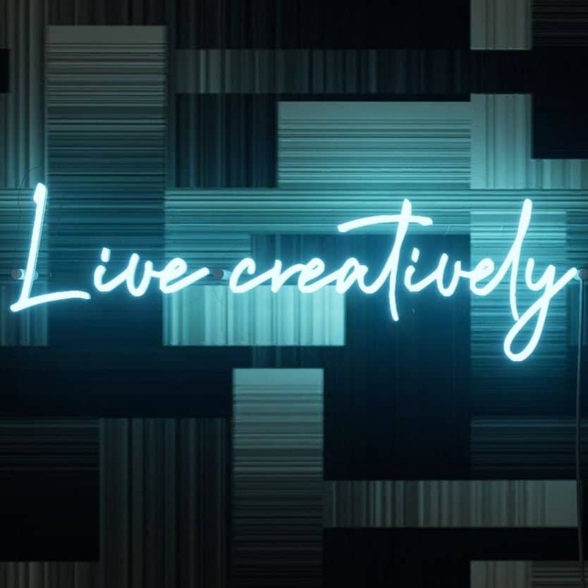 Neon sign living room by Live Creatively adding a touch of creative flair
