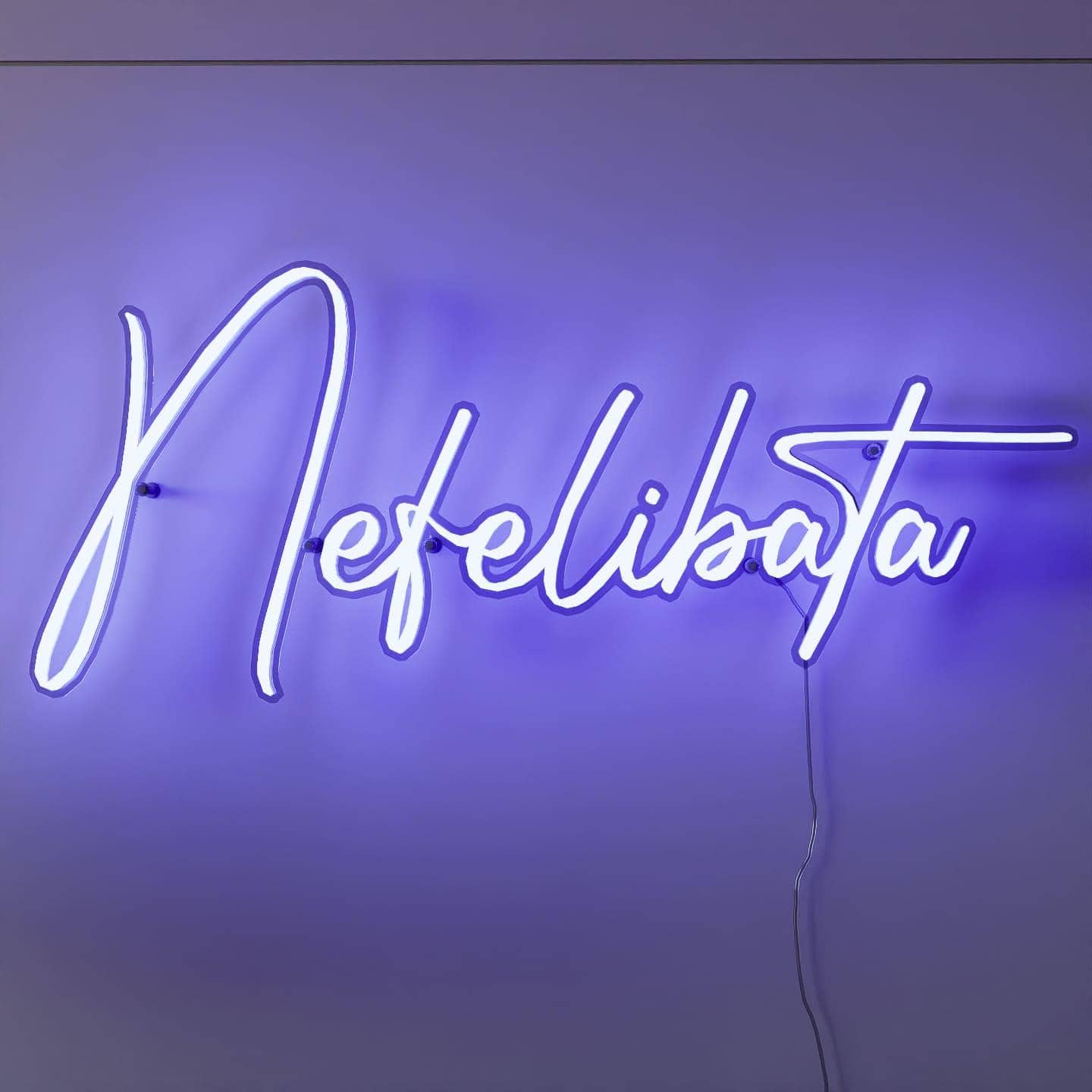 light-blue-neon-light-hanging-on-the-wall