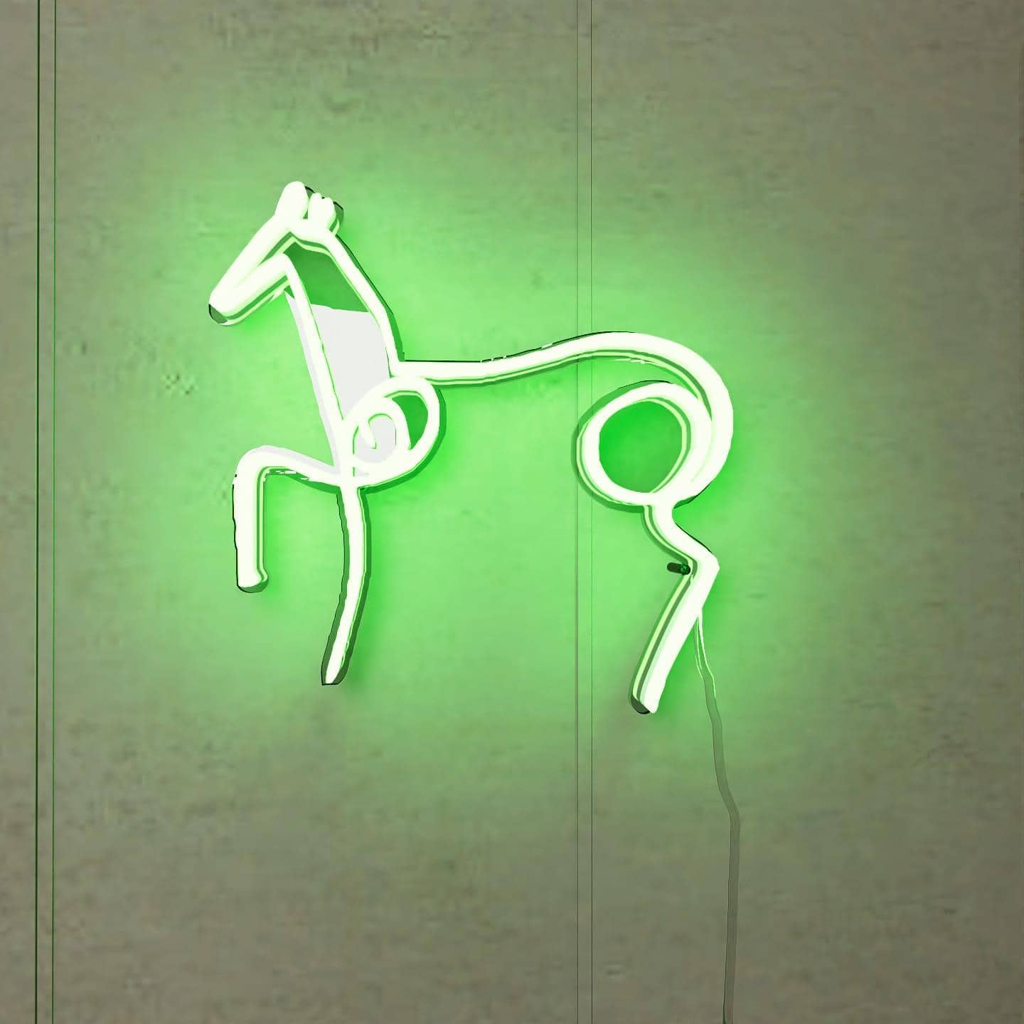 lighted-at-night-picasso-sketch-horse-hanging-on-wall-display-green