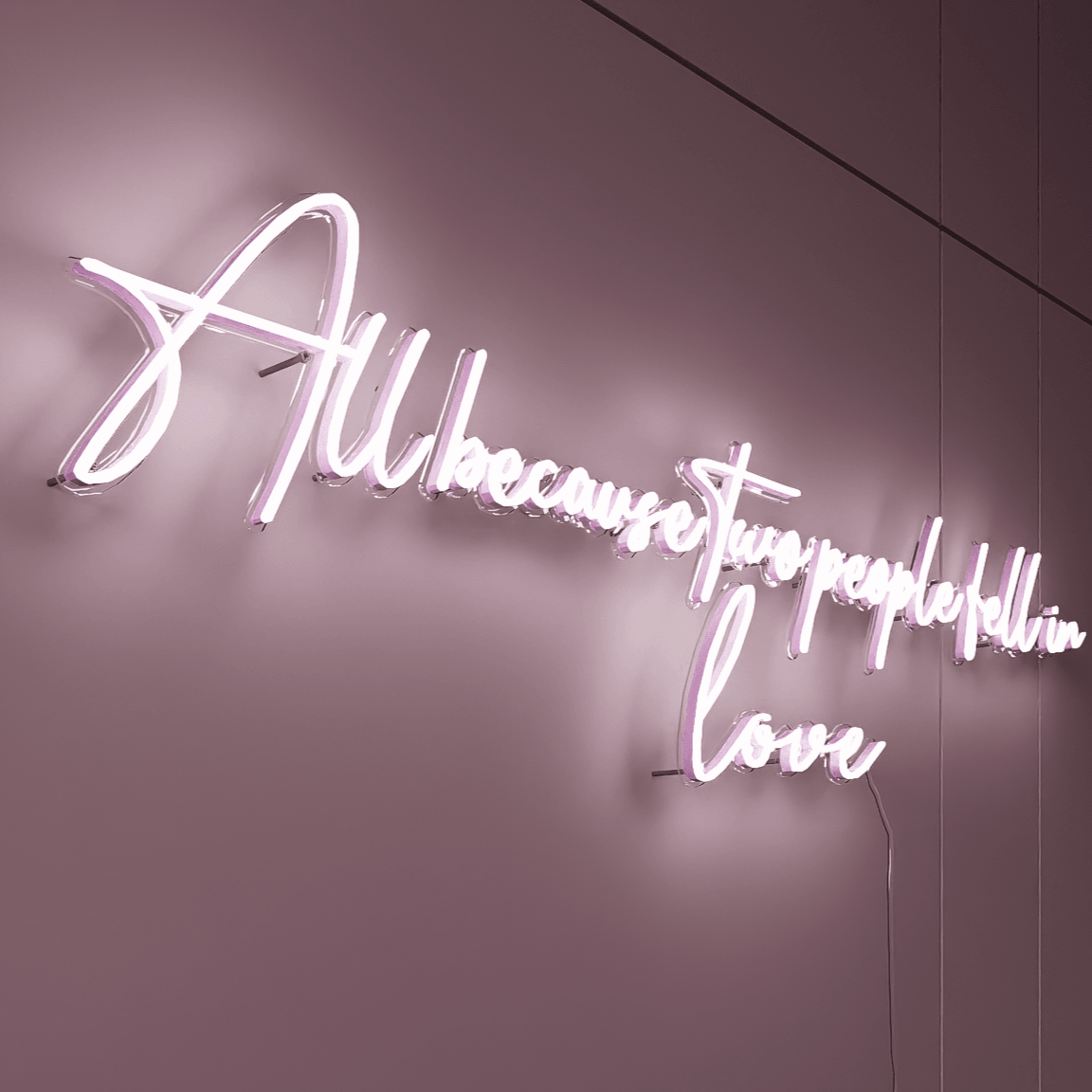 All Because Two People Fell in Love custom wedding neon sign in elegant script.