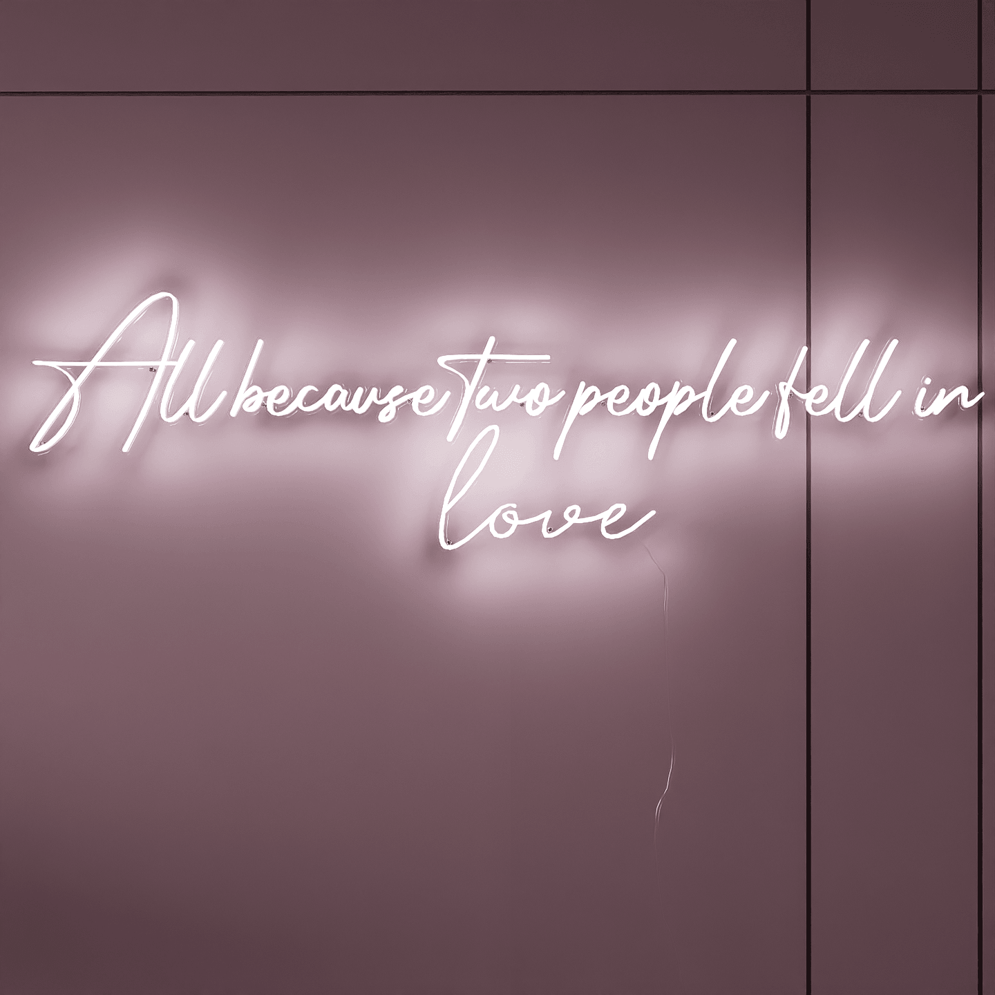 Romantic custom wedding neon signs displaying All Because Two People Fell in Love phrase.