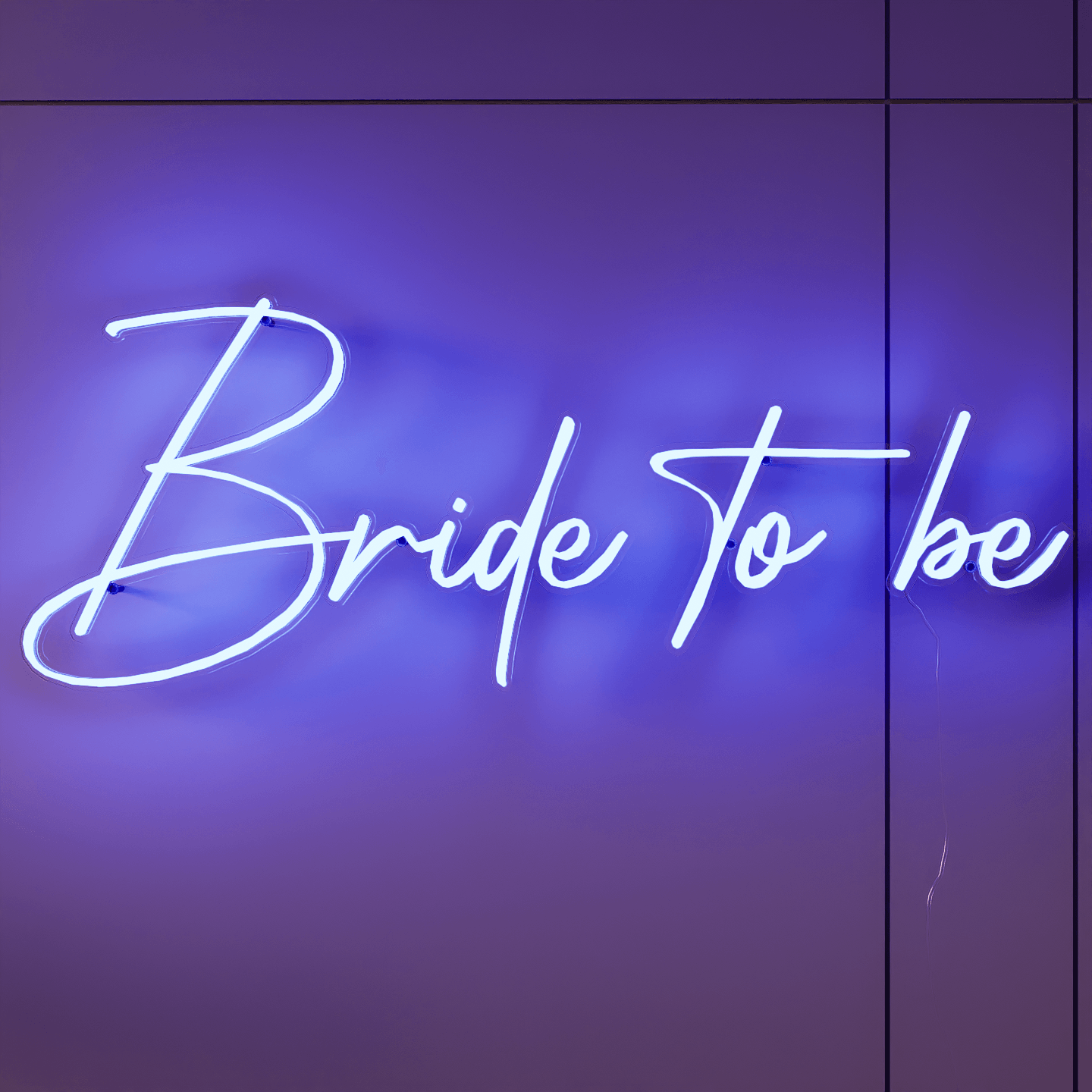light-up-blue-neon-lights-hanging-on-the-wall-for-display-bride-to-be-one