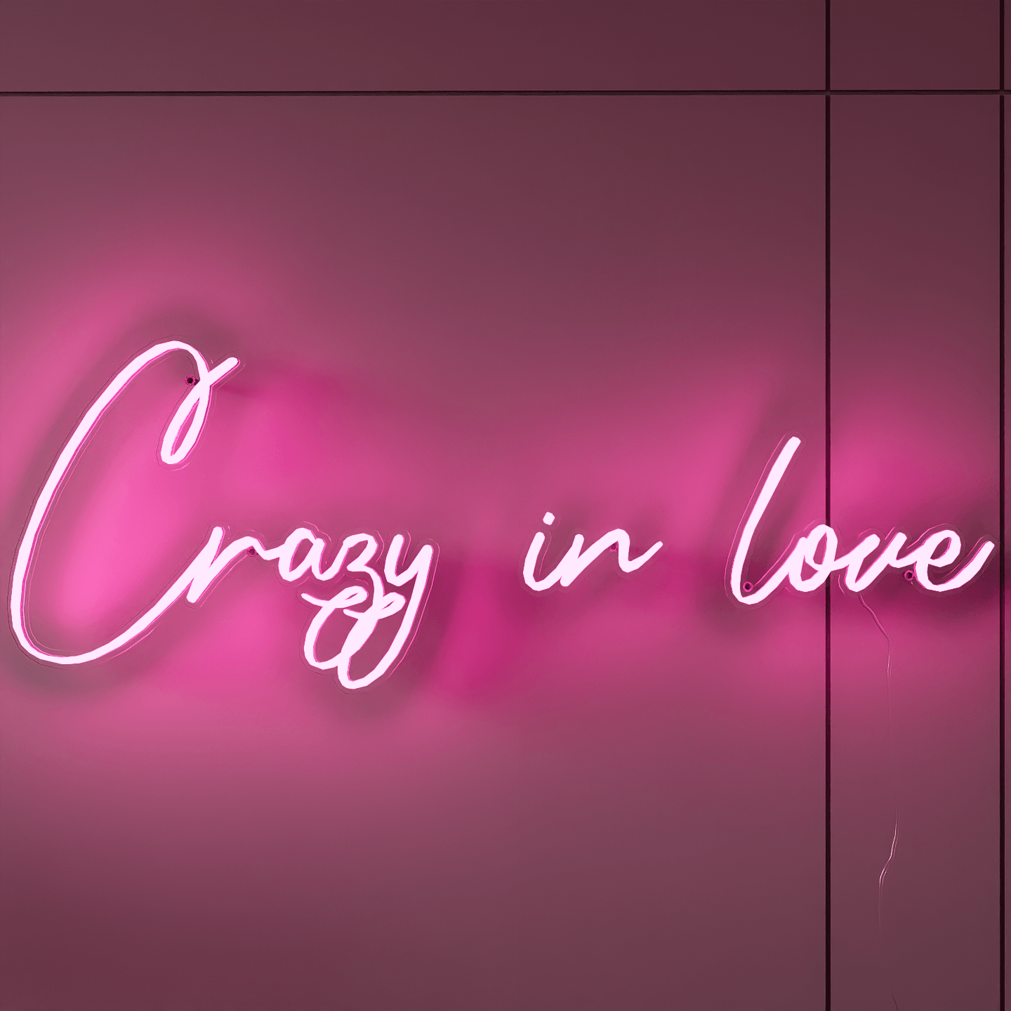 frontal-shot-of-lit-pink-neon-lights-hanging-on-the-wall-for-display-crazy-in-love