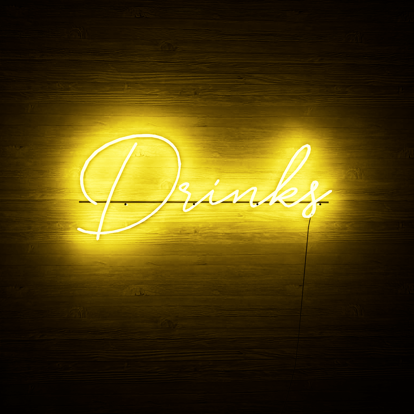 frontal-shot-of-yellow-neon-lights-lit-on-the-wall-at-night-drinks