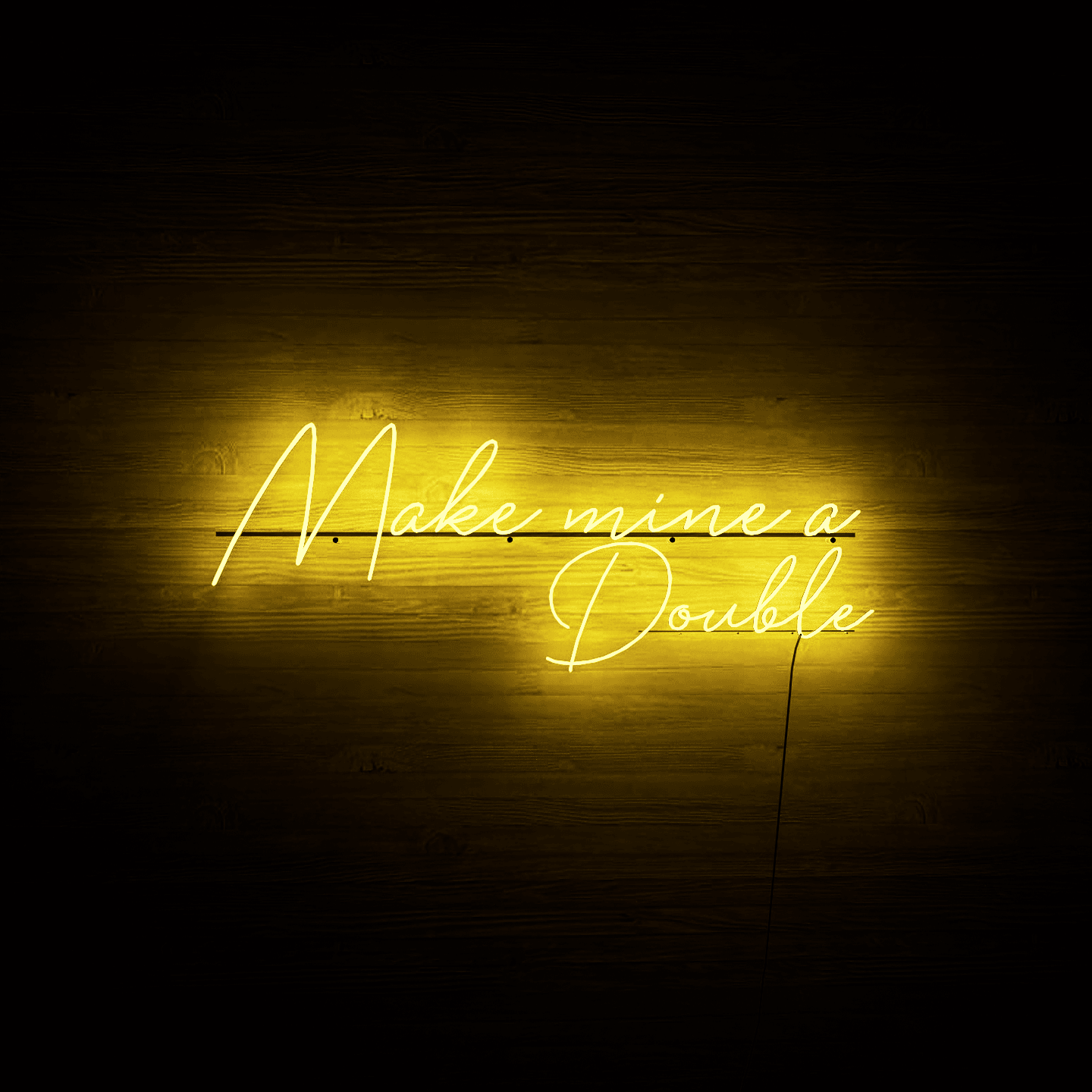 dark-night-lit-yellow-neon-lights-hanging-on-the-wall-for-display