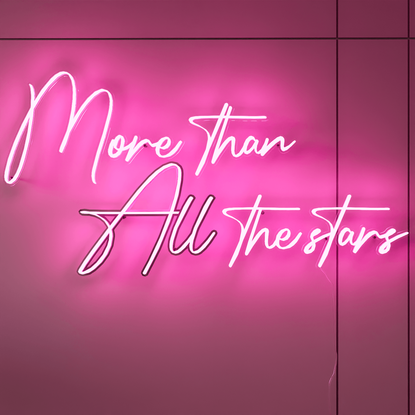 frontal-shot-of-pink-neon-lights-lit-up-at-night-and-hung-on-the-wall-for-display-more-than-all-the-stars