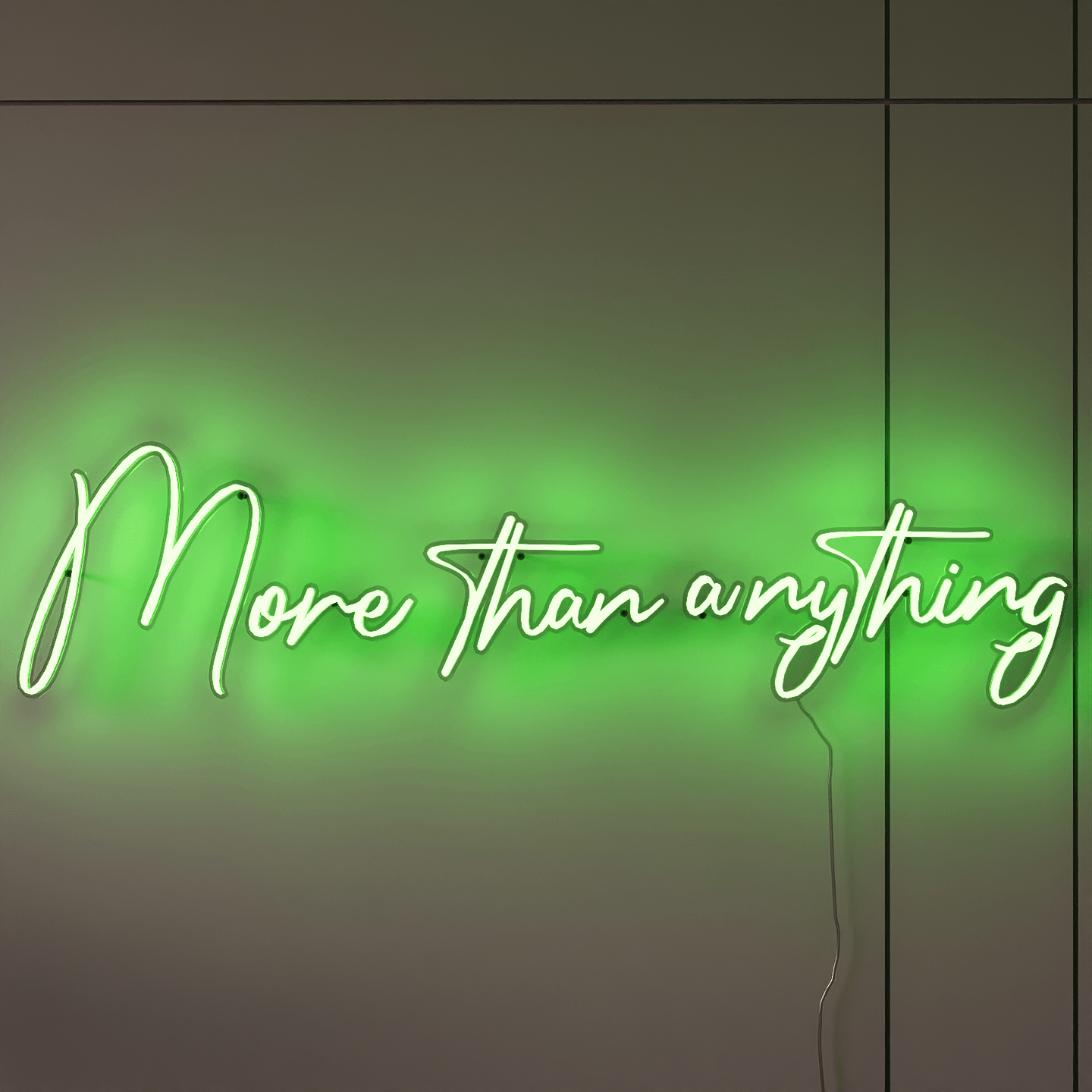 frontal-shot-of-illuminated-green-neon-lights-hanging-on-the-wall-at-night-more-than-anything