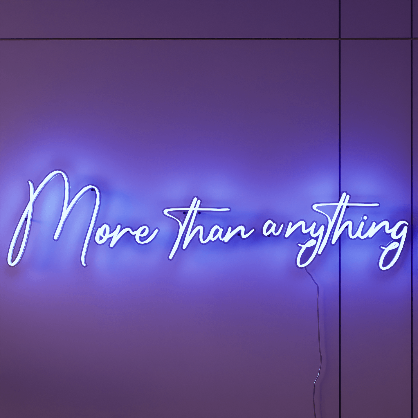 frontal-shot-of-illuminated-blue-neon-lights-hanging-on-the-wall-at-night-more-than-anything
