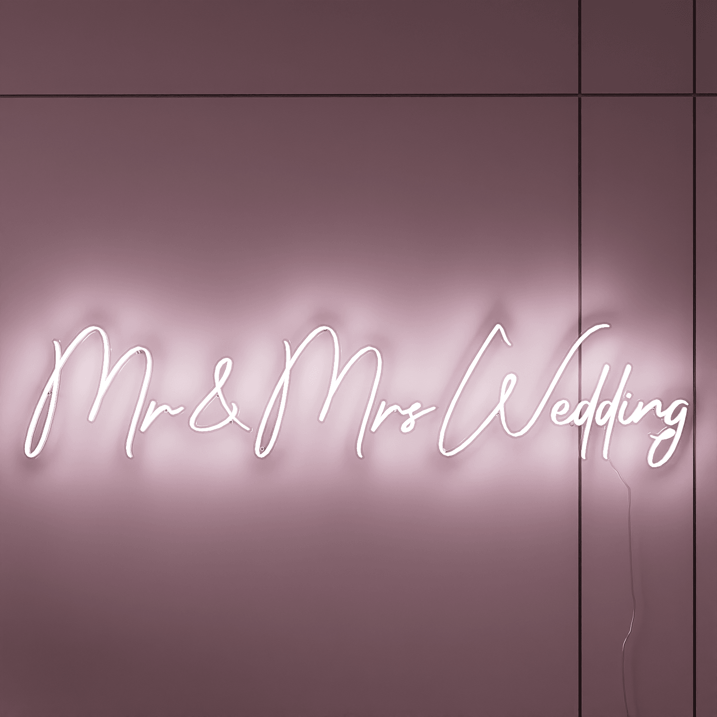 frontal-shot-of-illuminated-white-neon-lights-hanging-on-the-wall-at-nightmr-&-mrs-wedding