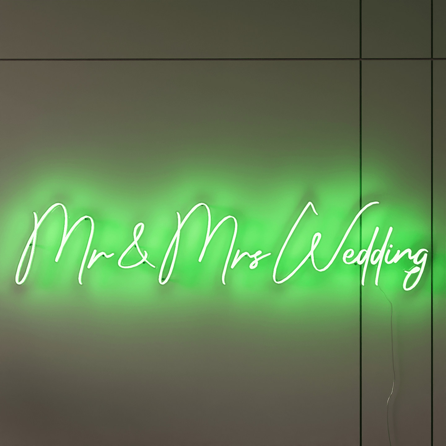 lighted-green-neon-lights-hanging-on-the-wall-at-night-mr-&-mrs-wedding