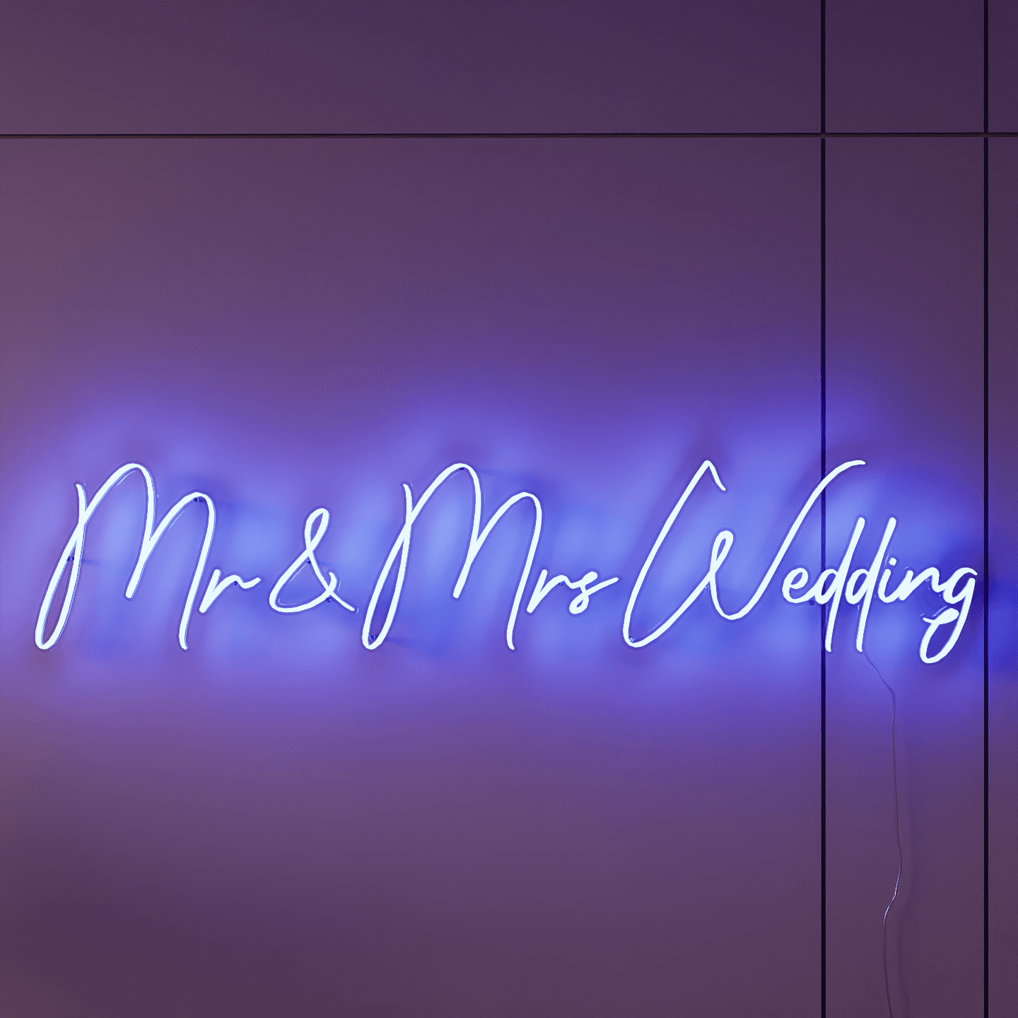 lighted-blue-neon-lights-hanging-on-the-wall-at-night-mr-&-mrs-wedding