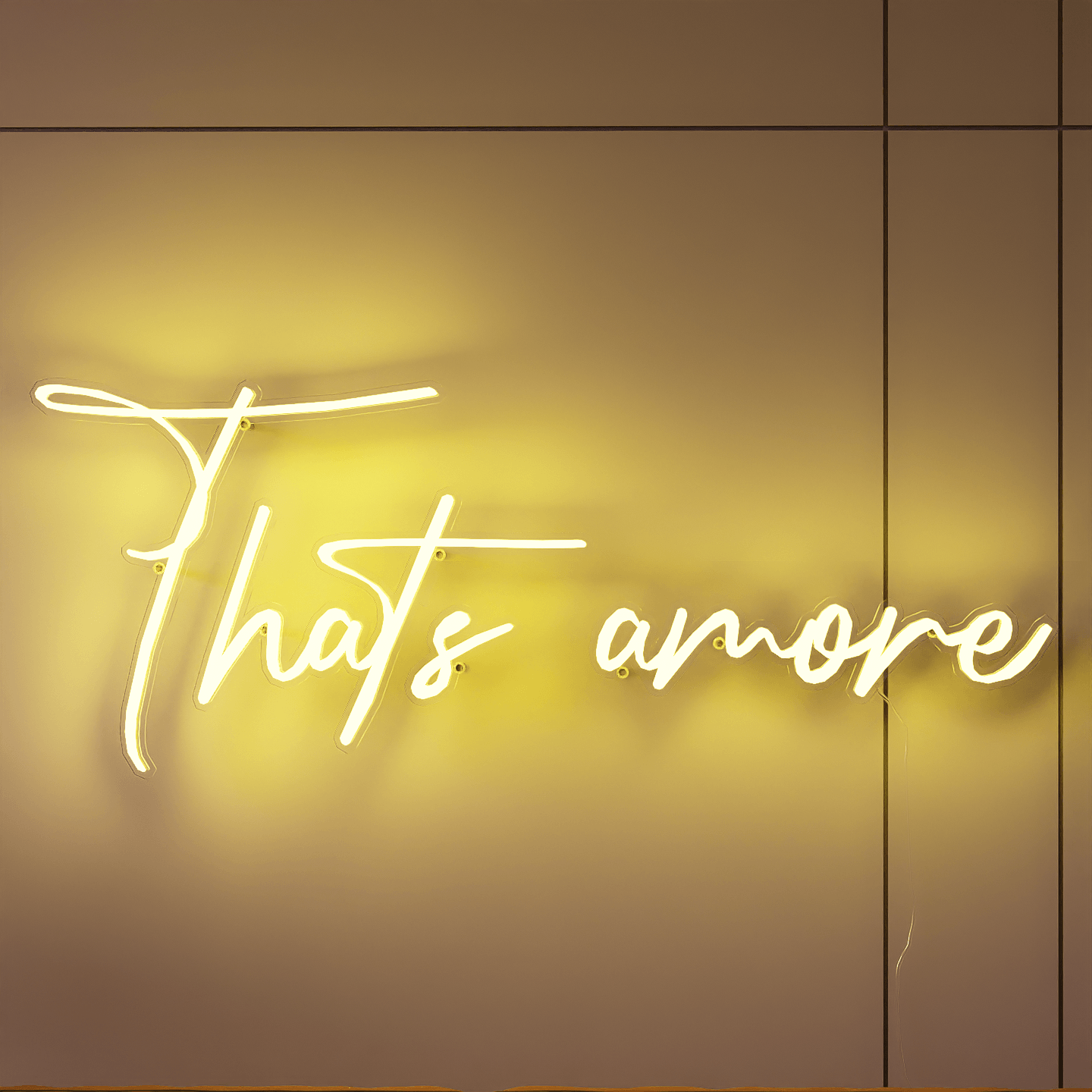 frontal-shot-of-bright-yellow-neon-lights-hanging-on-the-wall-at-night