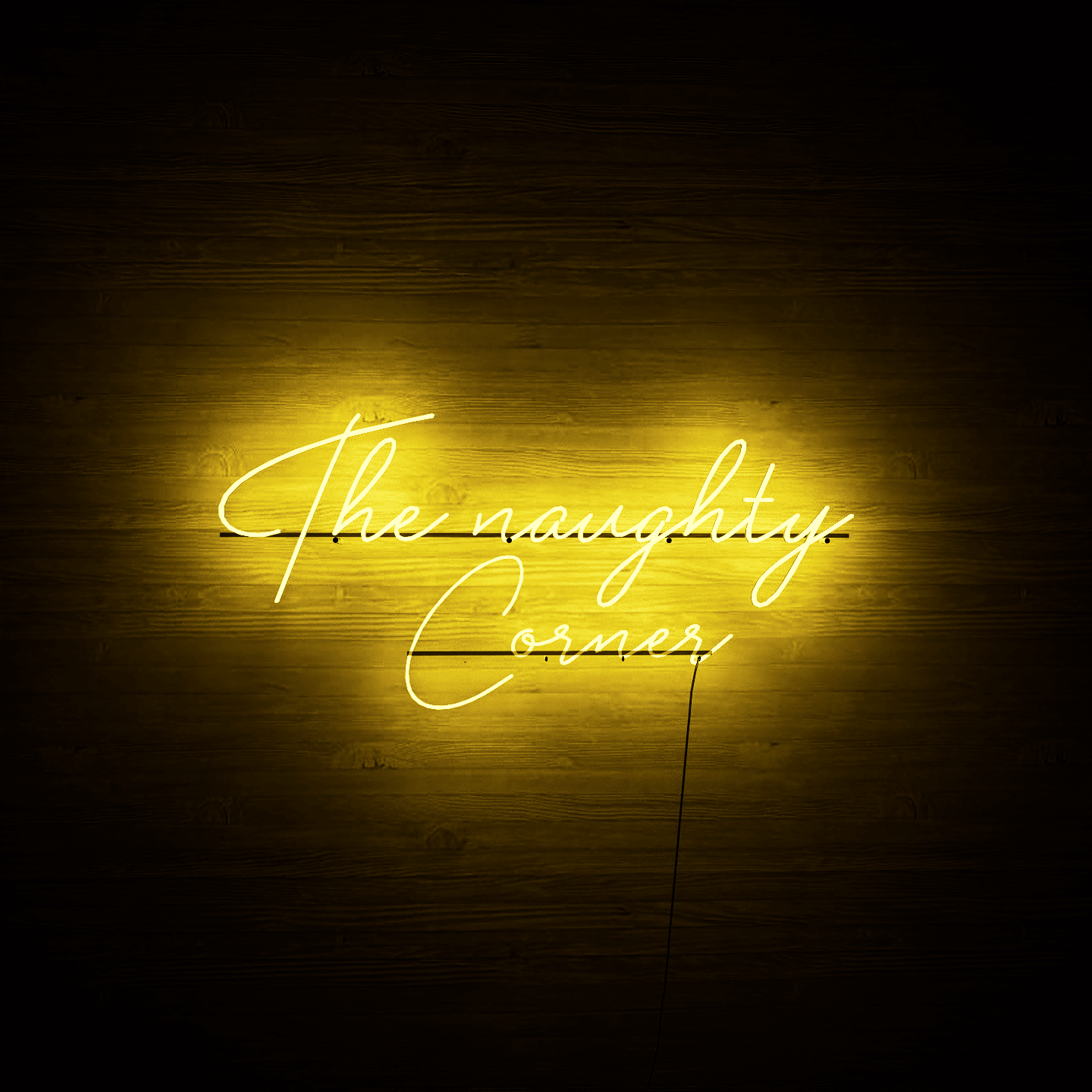 Dark night lit yellow neon lights hanging on the wall-The Naughty Corner