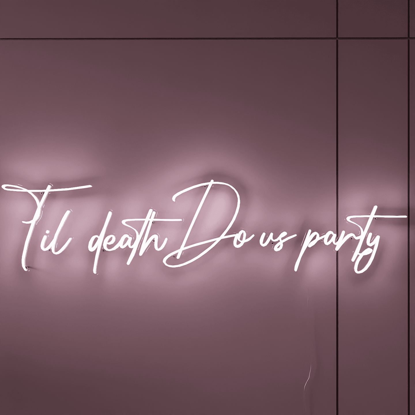 lighted-white-neon-sign-hanging-on-the-wall-at-night-til-death-do-us-party