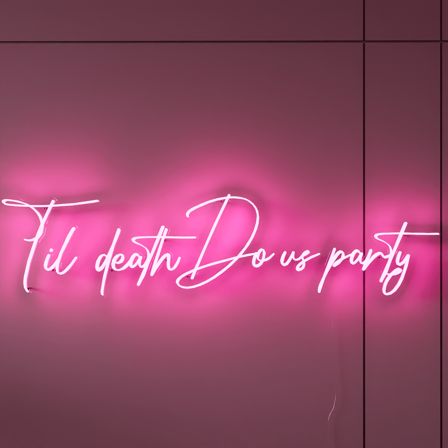 frontal-shot-of-pink-neon-sign-lit-up-on-the-wall-at-night-til-death-do-us-party