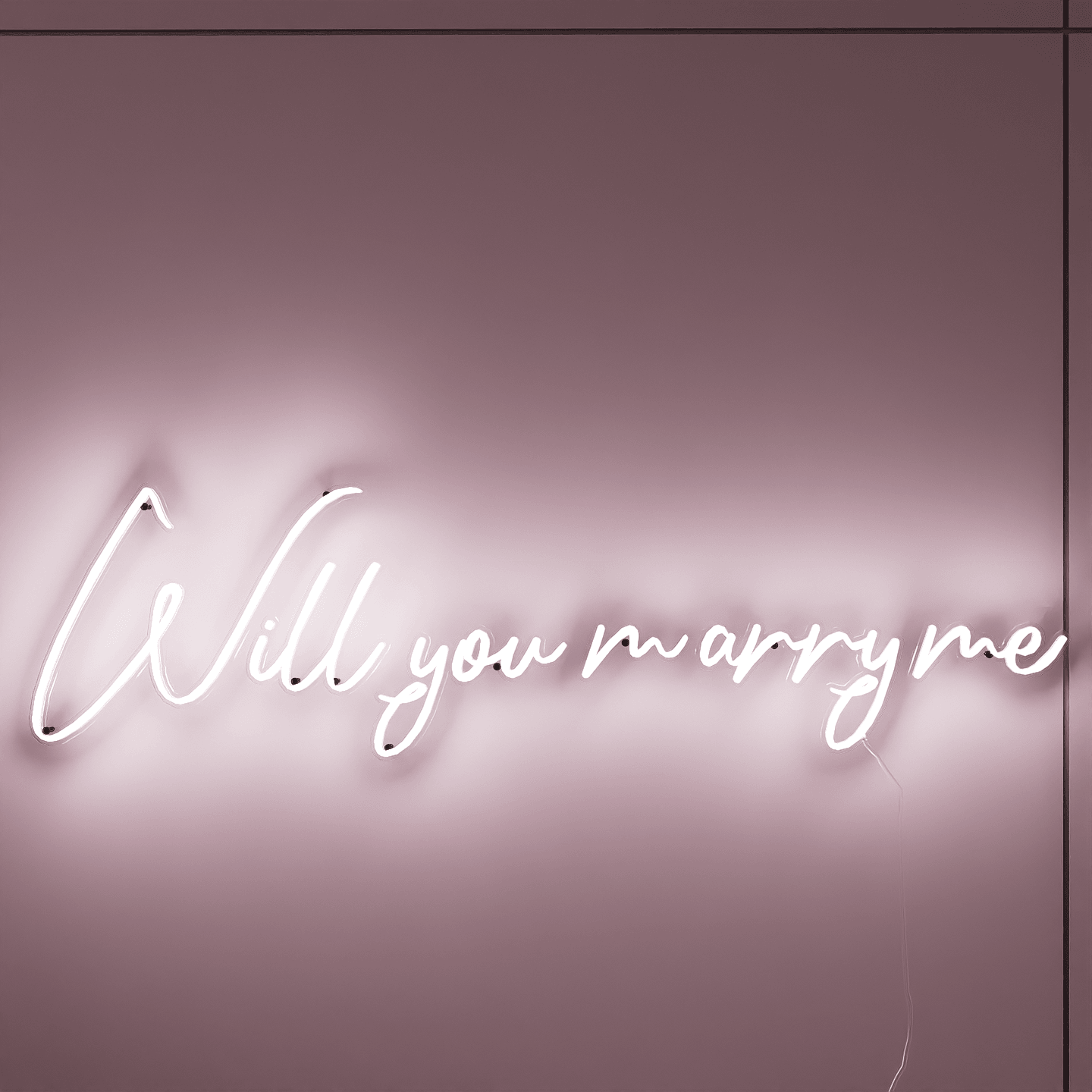 frontal-shot-of-lit-white-neon-lights-hanging-on-the-wall-will-you-marry-me