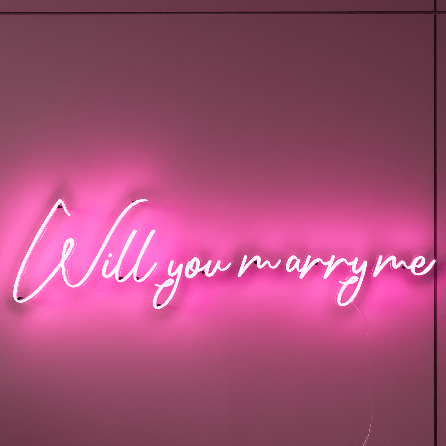 light-pink-neon-lights-hanging-on-the-wall-will-you-marry-me