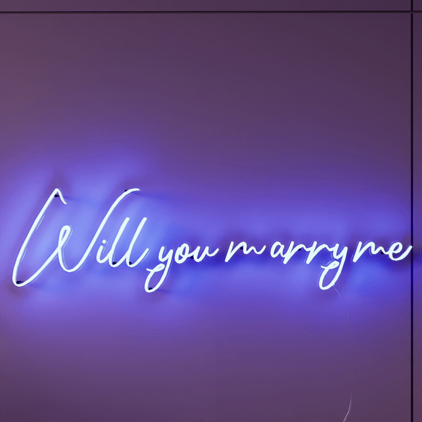 frontal-shot-of-lit-green-neon-lights-hanging-on-the-wall-will-you-marry-me