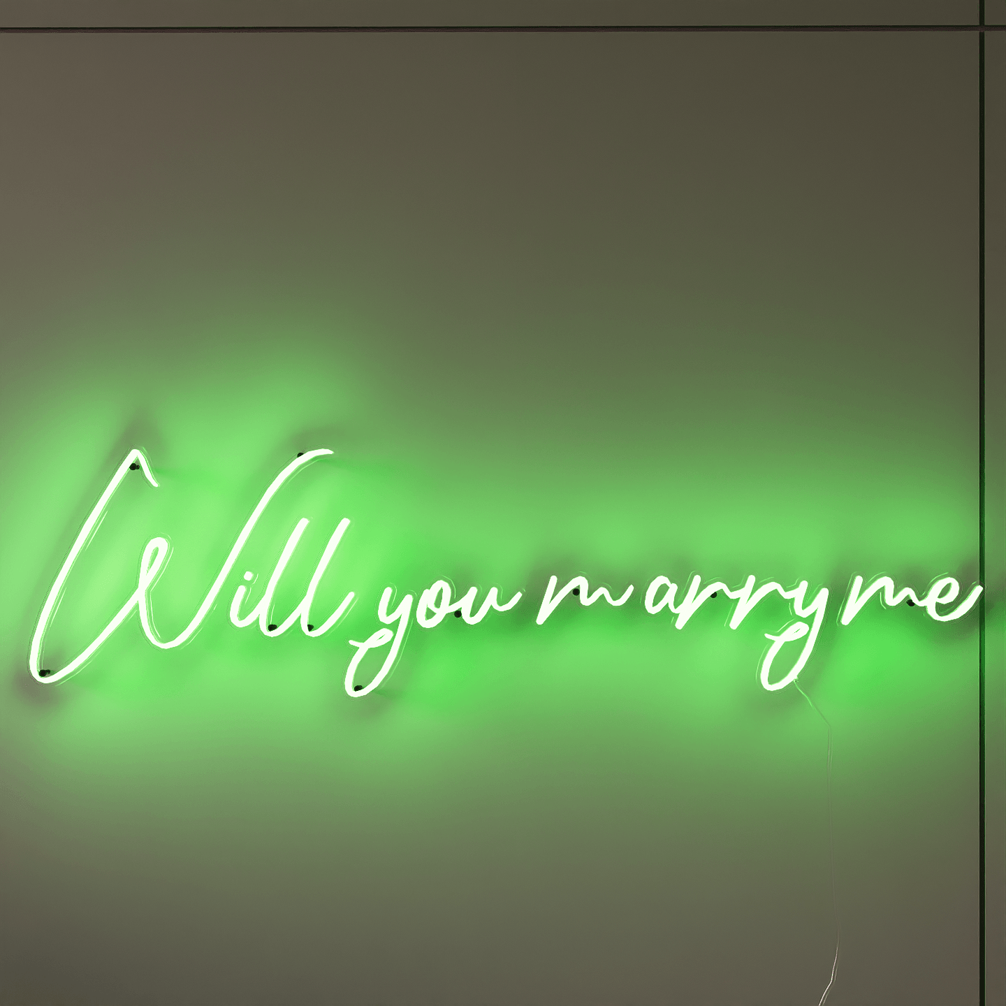 frontal-shot-of-lit-green-neon-lights-hanging-on-the-wall-will-you-marry-me
