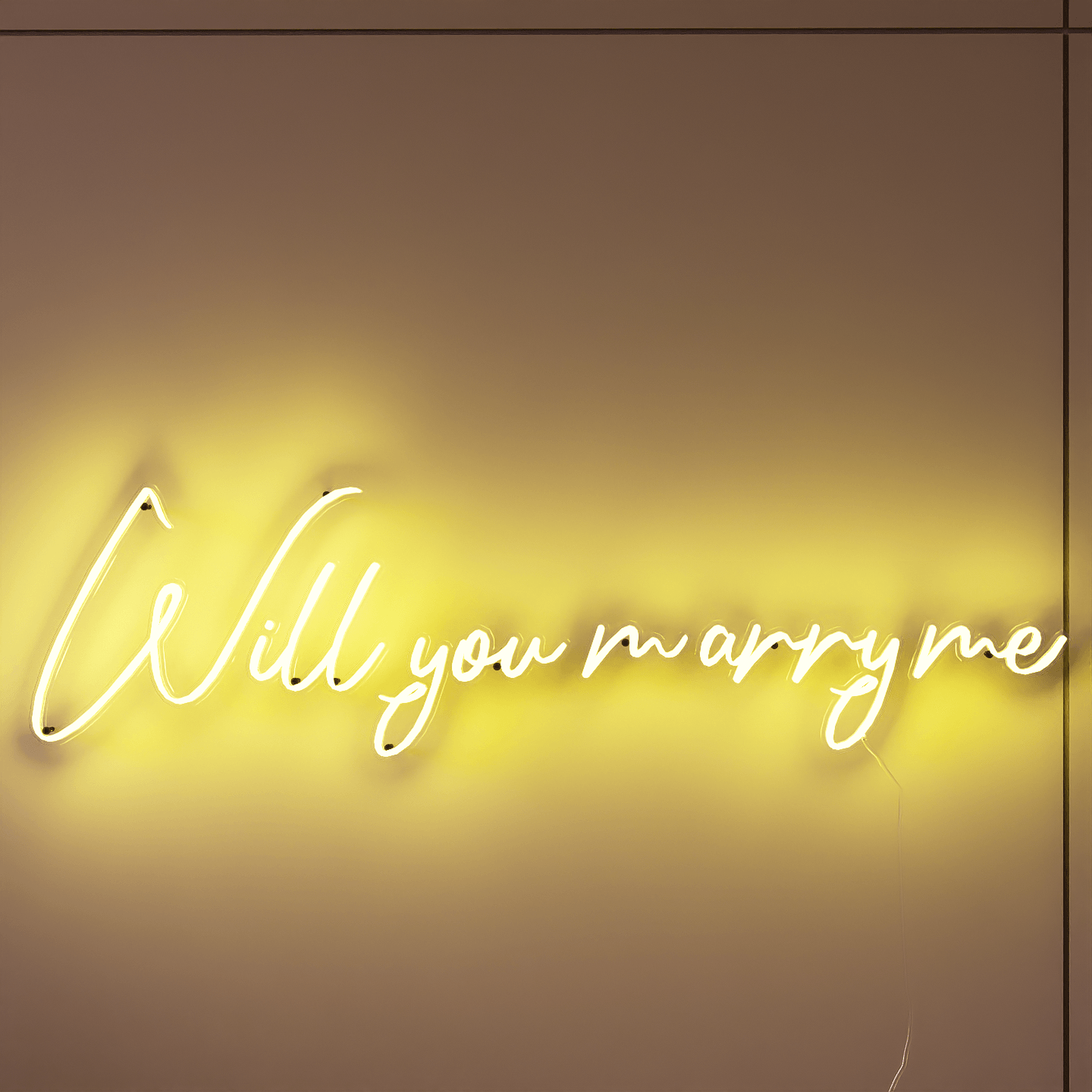 Frontal shot of lit yellow neon lights hanging on the wall-Will You Marry Me