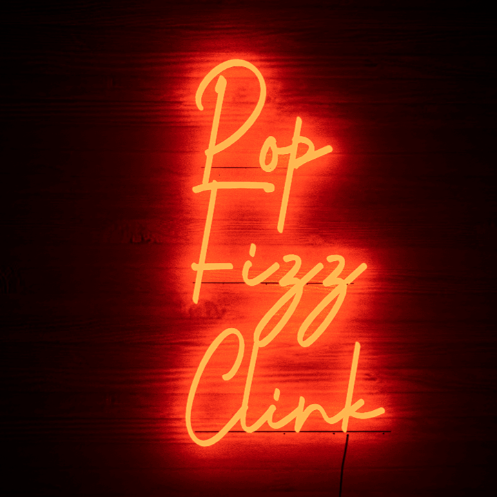 red-neon-light-hanging-on-the-wall