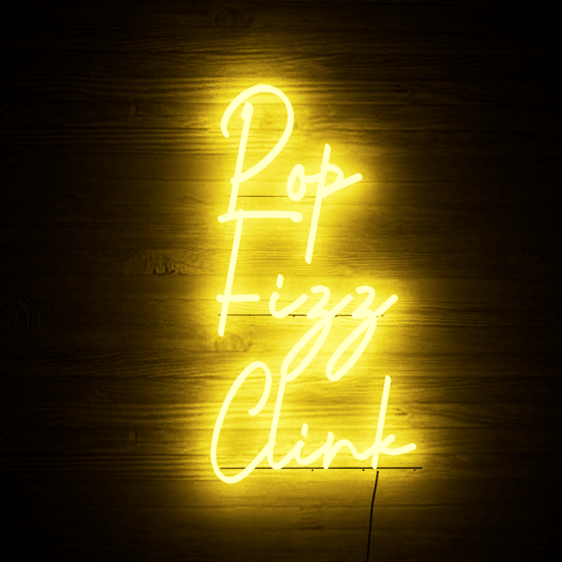 light-up-golden-neon-lights-hanging-on-the-wall