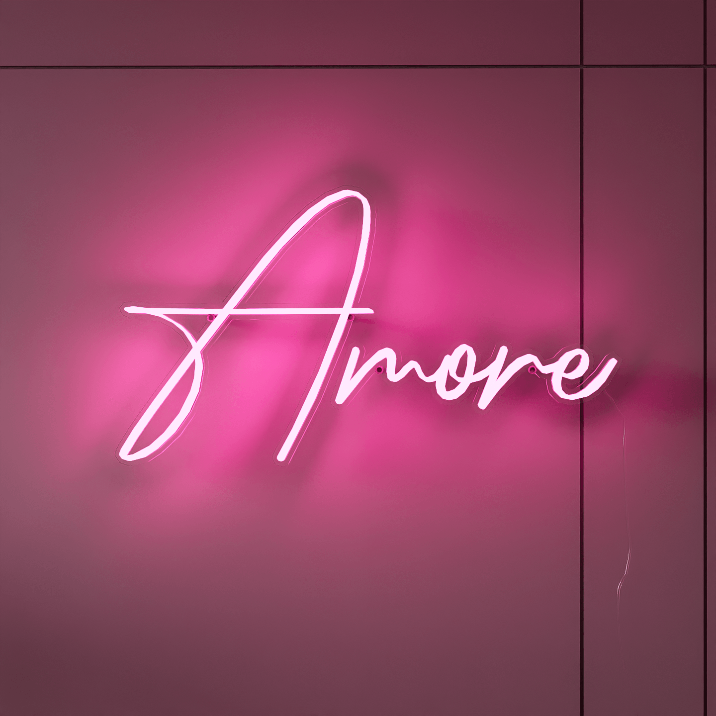 a neon sign in the shape of a heart with "amore" written inside, glowing in a romantic red or pink hue.