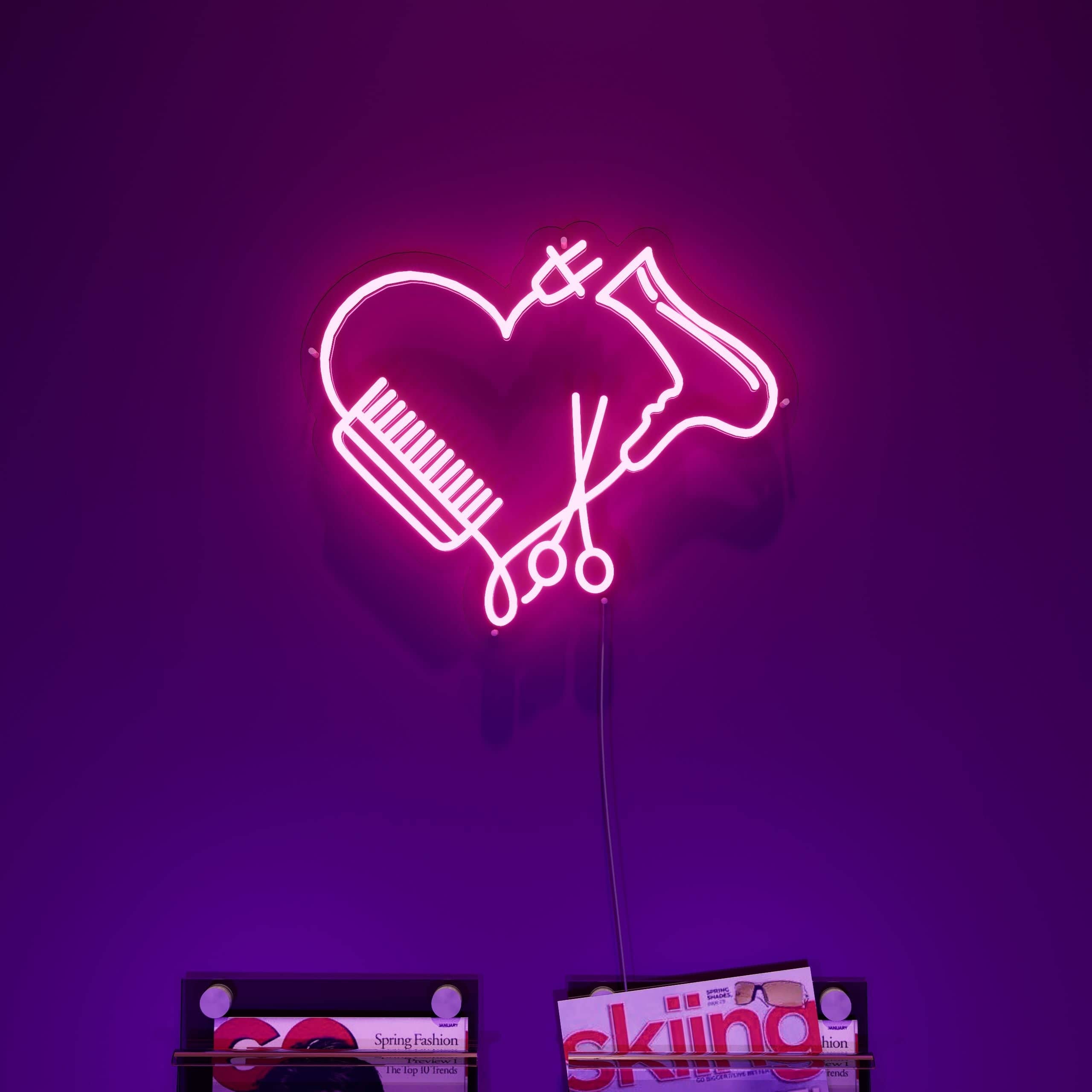 Warm inviting light of heart shaped salon sign