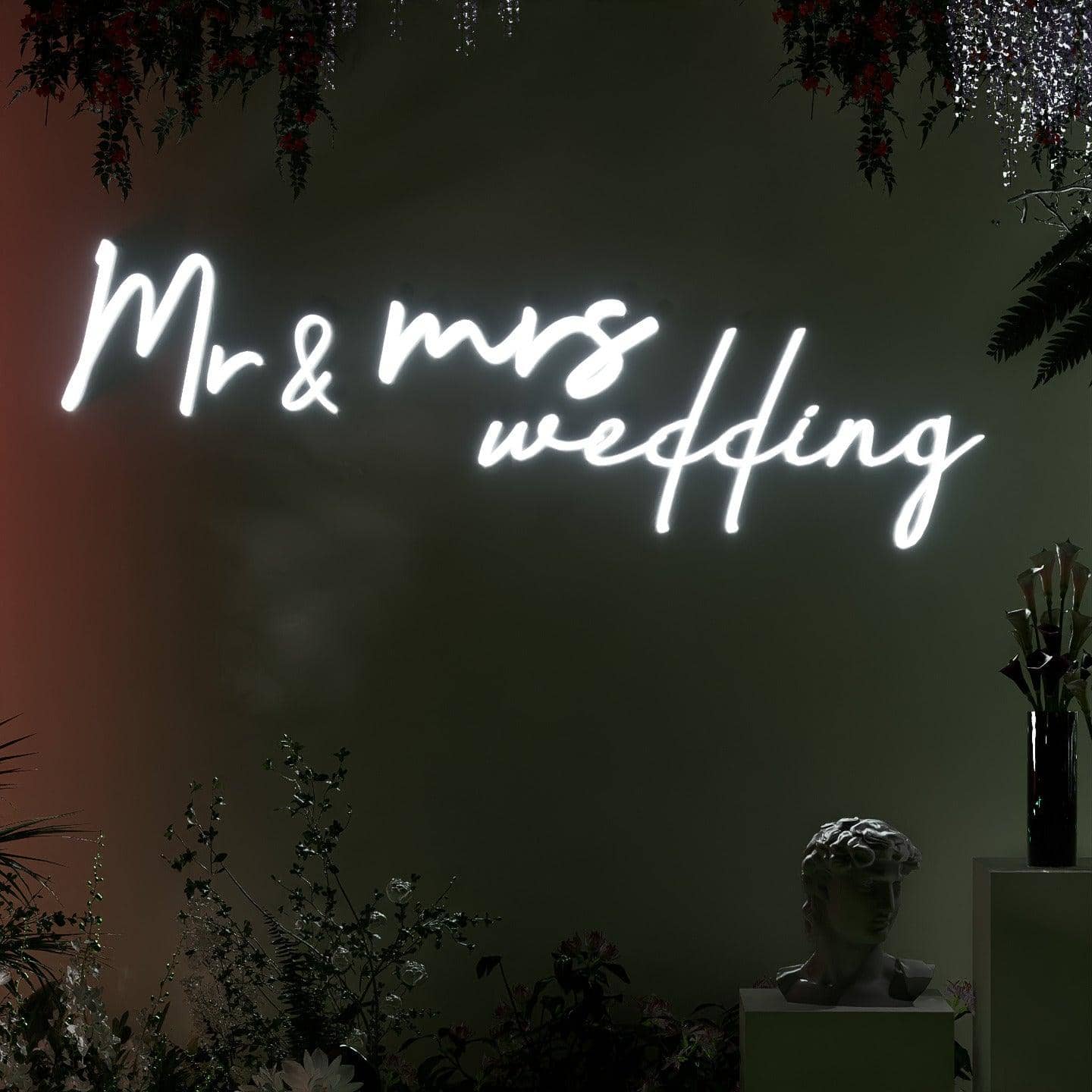 frontal-shot-of-illuminated-white-neon-lights-hanging-on-the-wall-at-nightmr-&-mrs-wedding