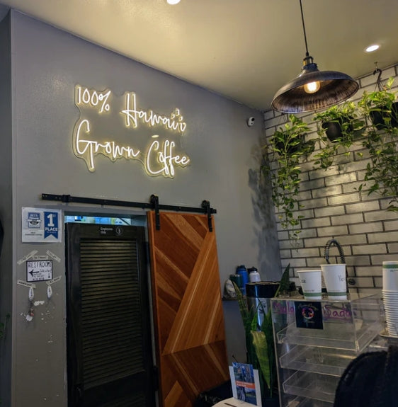 How do custom LED light signs enhance spaces and guide design choices?