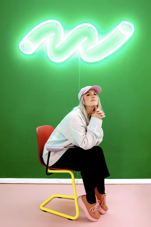 How do inexpensive neon signs shape home decor aesthetics today?