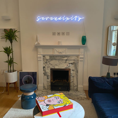 How do custom-designed neon signs impact modern advertising and design?