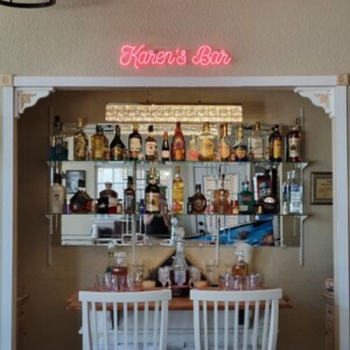 Tiki Bar Neon Sign brings tropical vibes to your space with bright colors