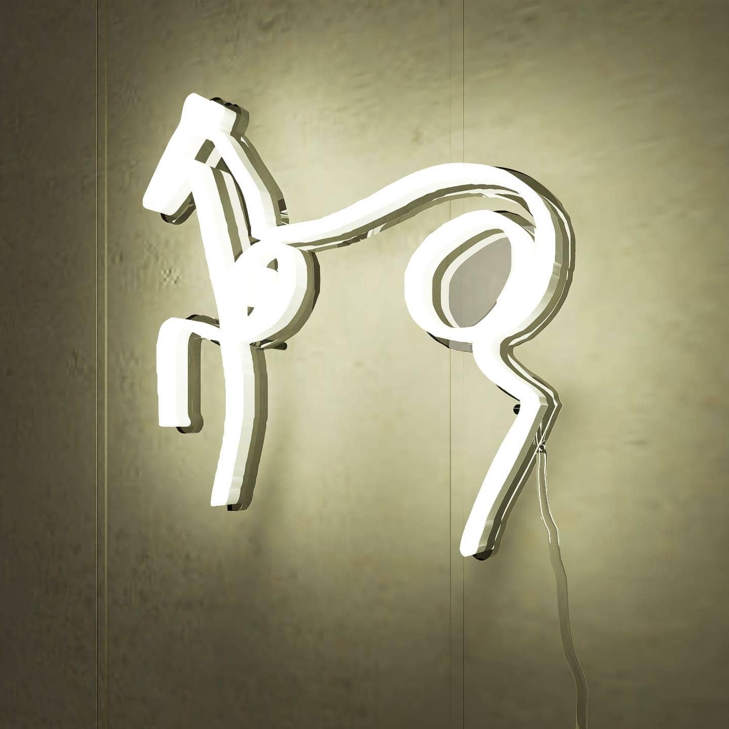 lighted-at-night-picasso-sketch-horse-hanging-on-wall-display-white