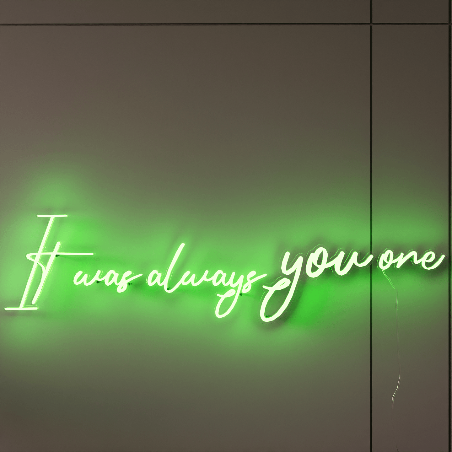 Side-front-shot-of-lit-green-neon-light-hanging-on-wall-for-display-it-was-always-you-one