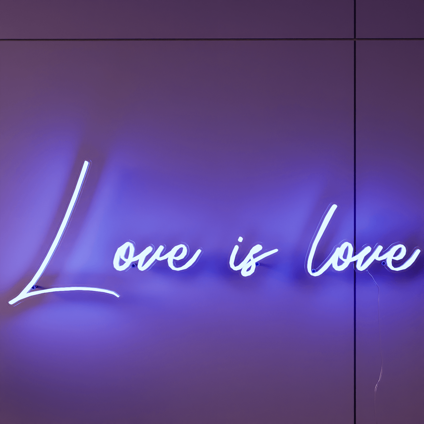 frontal-shot-of-lit-blue-neon-lights-hanging-on-wall-for-display-love-is-love