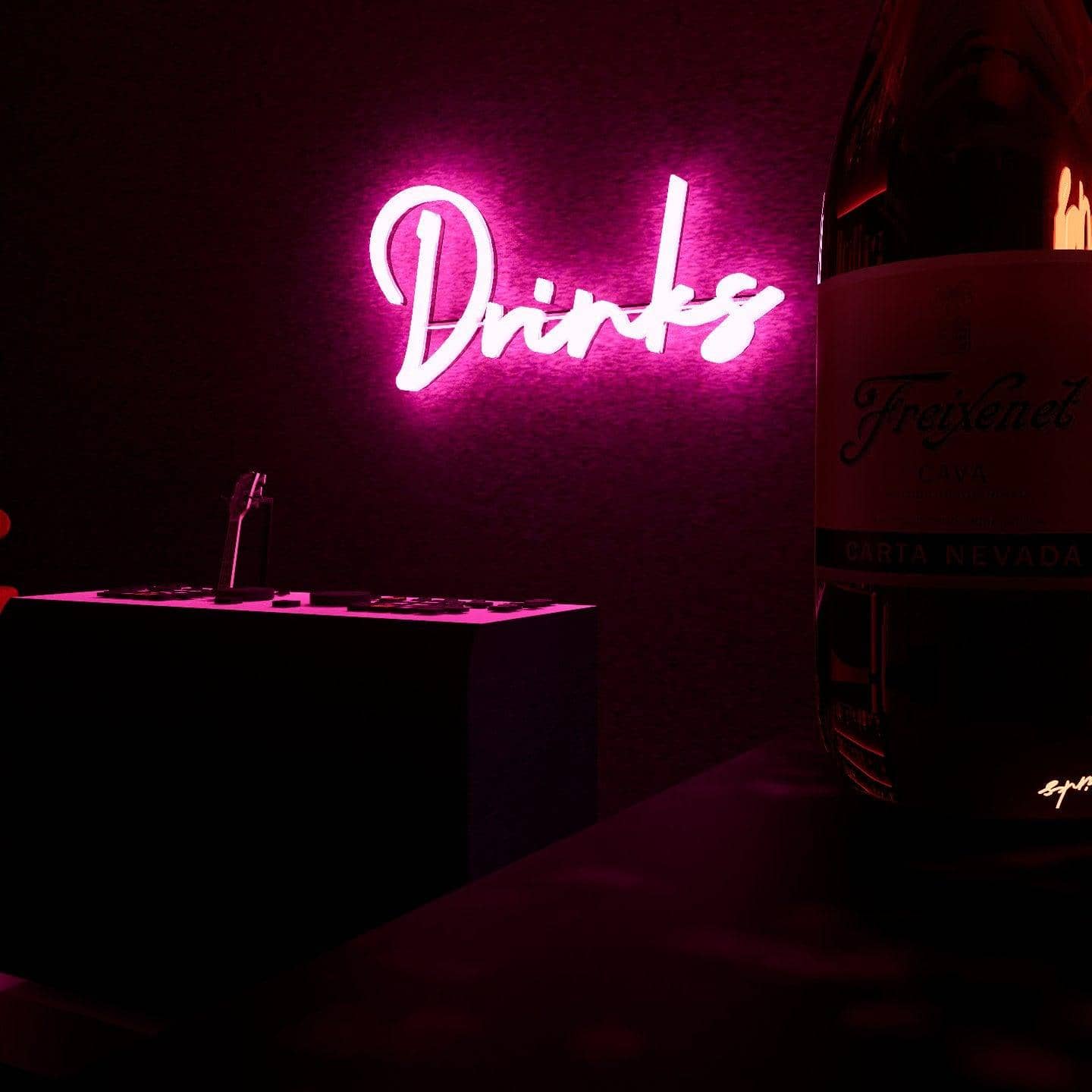 pink-neon-light-hanging-on-the-wall-drinks