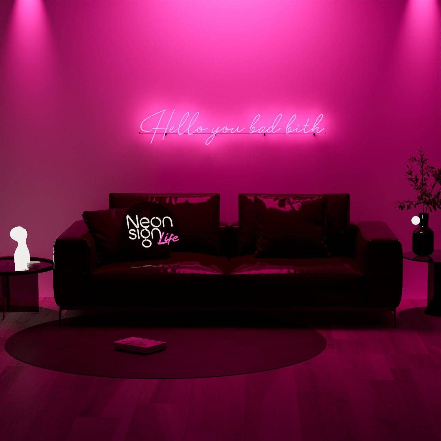 night-shot-of-lit-pink-neon-lights-hanging-on-the-wall-for-display-hello-you-bad-bith