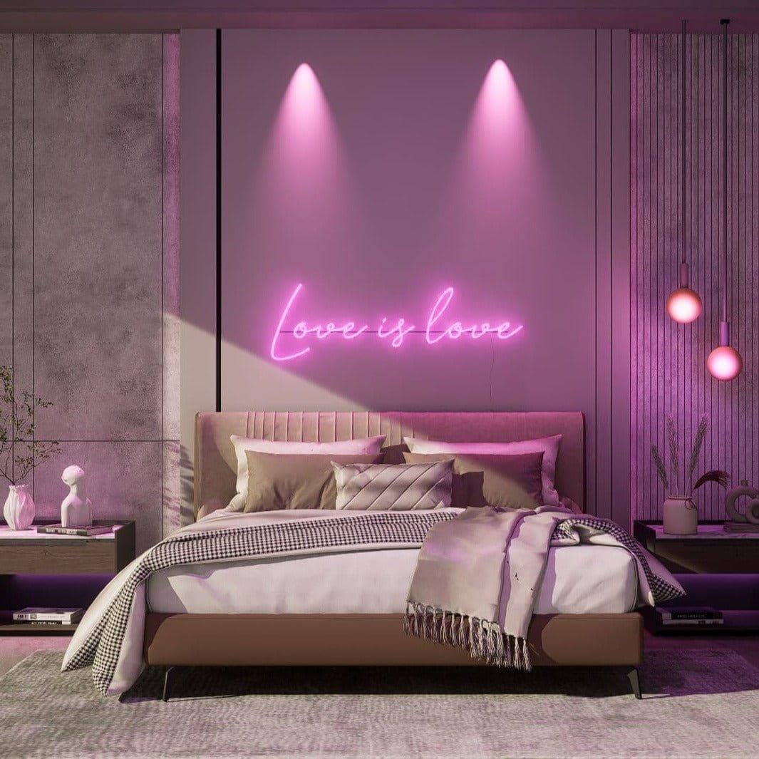 shot-during-the-day-with-pink-neon-lights-hanging-on-the-wall-for-display-love-is-love
