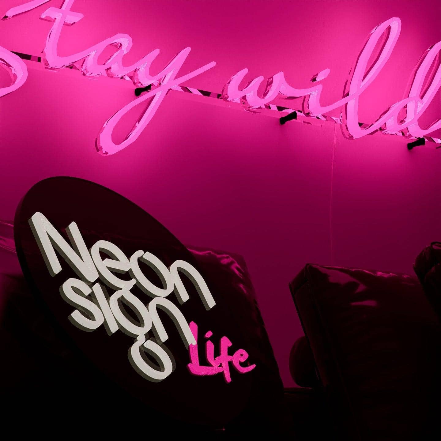 dark-night-lit-pink-neon-lights-hanging-on-the-wall-for-display-stay-wild