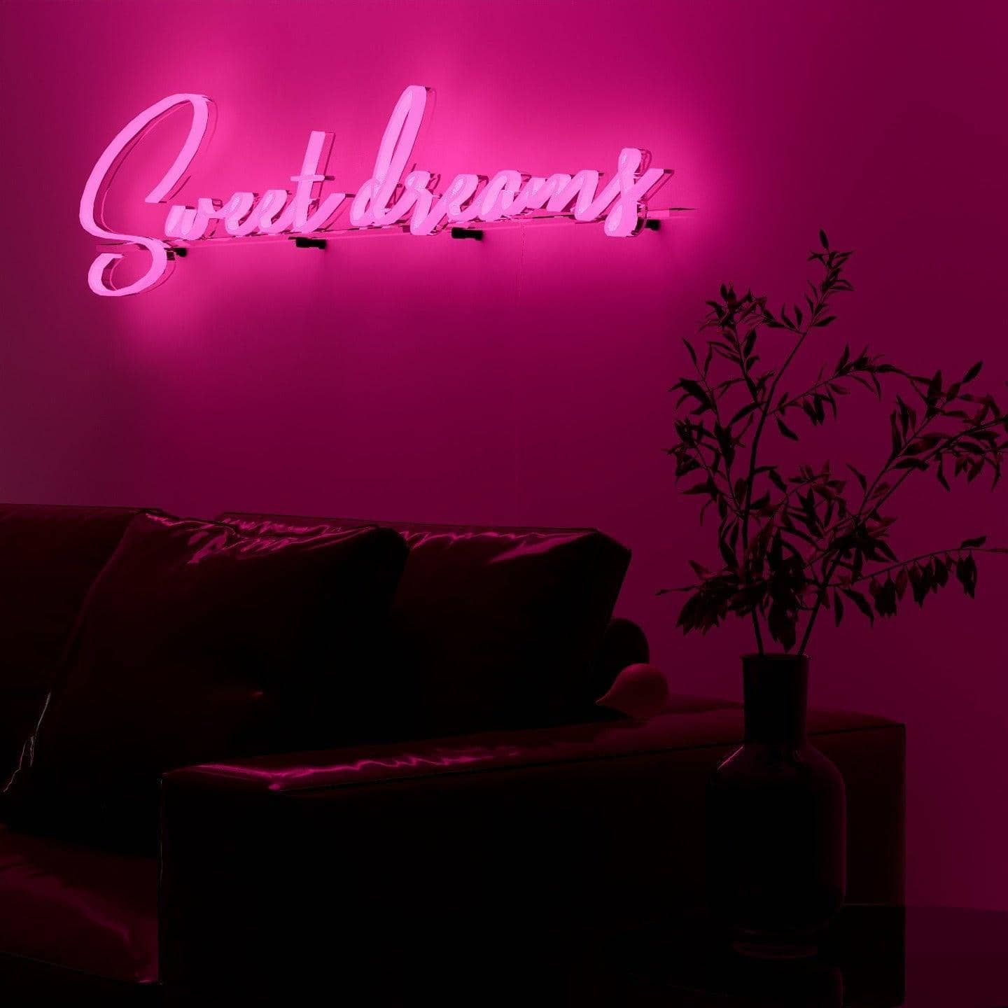 dark-night-lit-pink-neon-lights-hanging-on-the-wall-for-display-sweet-dreams