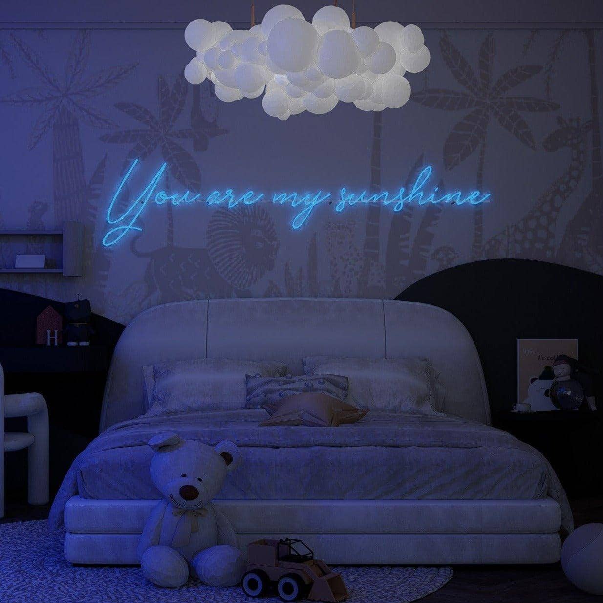 frontal-shot-of-illuminated-blue-neon-lights-hanging-on-the-wall-you-are-my-sunshine