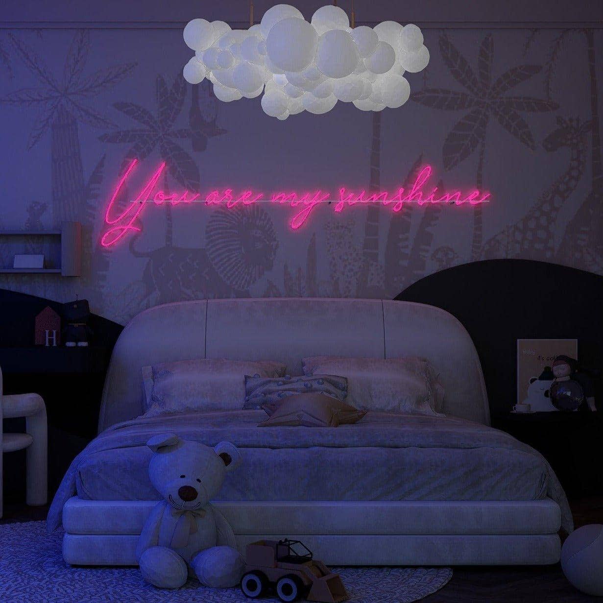 frontal-shot-of-pink-neon-lights-hanging-on-the-wall-you-are-my-sunshine