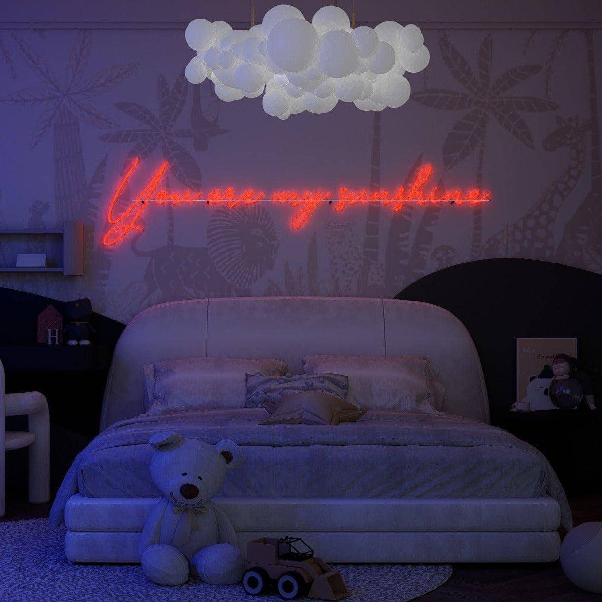 frontal-shot-of-lit-red-neon-lights-hanging-on-the-wall-you-are-my-sunshine
